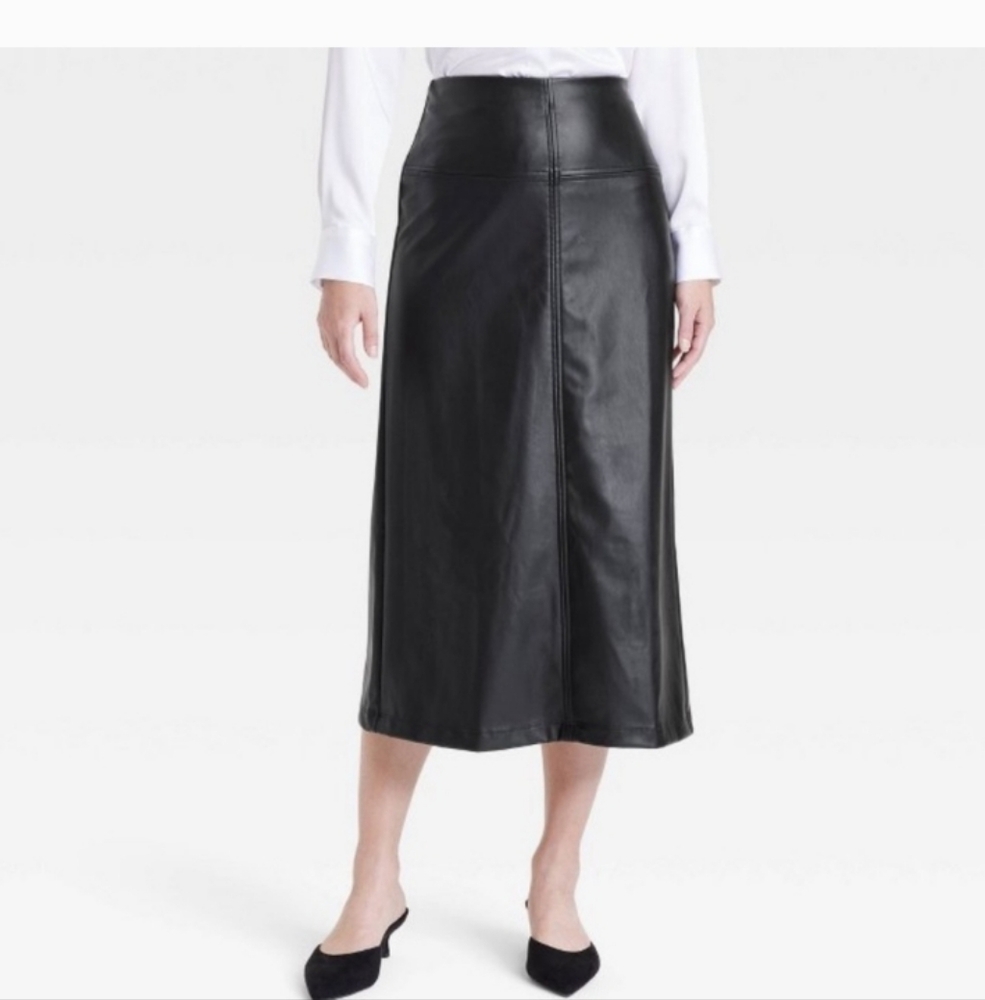Elegant Faux  Butter Leather Skirt . Slit In The Back Side Zip Midi Length.